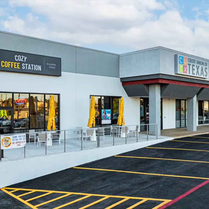 Cozy Coffee Station and Credit Union of Texas storefronts in a Kilgore, Texas retail center