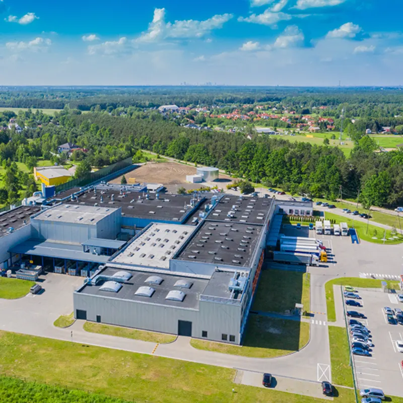 Aerial view of a large warehouse and industrial facility